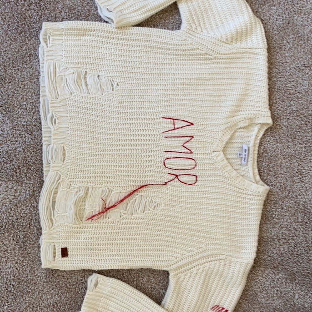 Oversized distressed sweater